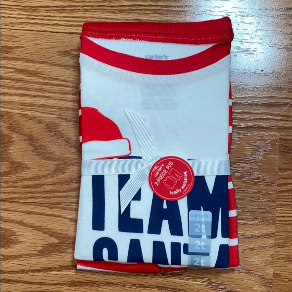 Carter’s 2 piece Team Santa pajamas NWT